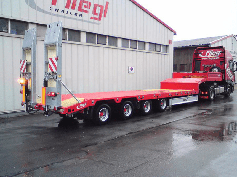 Полуприцеп-трал Fliegl SVS 570 T низкорамный-0