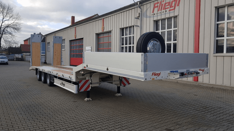 Полуприцеп-трал Fliegl SDS 470 низкорамный-0